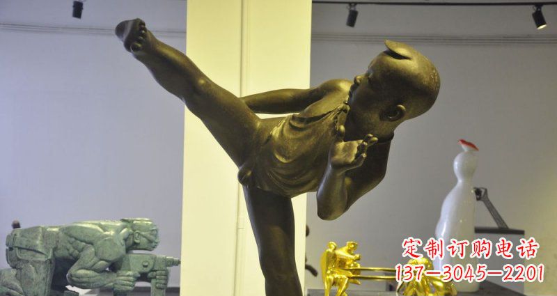 桂林领雕塑男孩练功夫铜雕