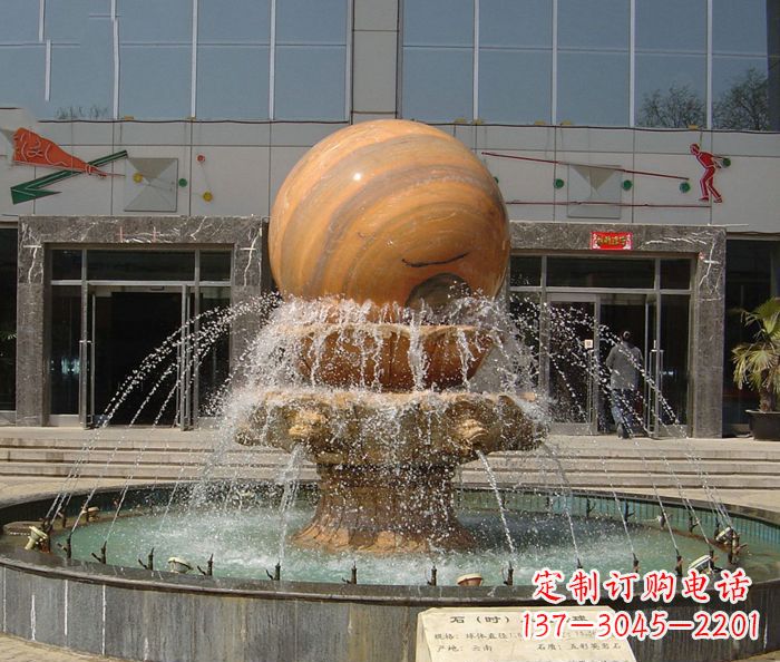 桂林石来运转球晚霞红风水球石雕